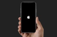Apple logo on a smartphone screen. Apple encrypted data | PGN Business Insider