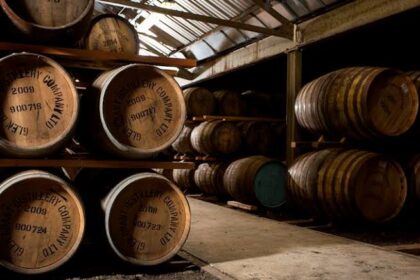 Aged whisky barrels in a Scottish distillery English Single Malt Proposal Sparks Clash