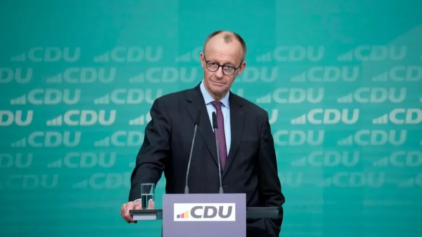 Friedrich Merz speaking at a press conference. | Germany spending deal | PGN Business Insider