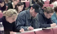 Government press conference on student loan fraud crackdown. | PGN Business Insider