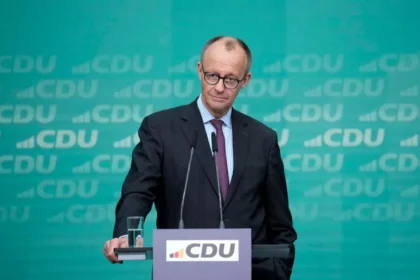 Friedrich Merz speaking at a press conference. | Germany spending deal | PGN Business Insider
