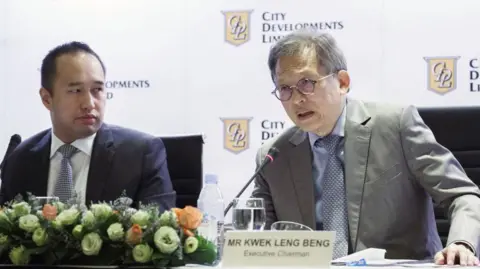 Father and son at a 2019 press conference, symbolizing their fractured relationship. Kwek family feud | CDL takeover