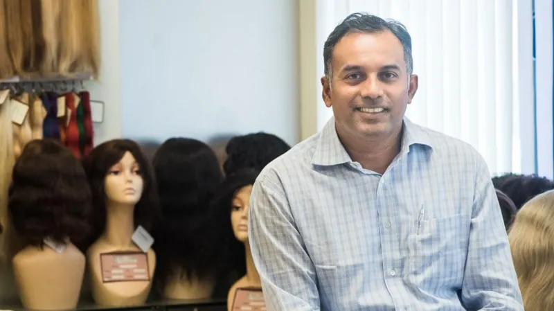 CEO George Cherion overseeing production in a high-tech Wig | Industry in India