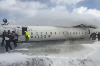 Delta Flight 271 inverted on Toronto runway after crash-landing.