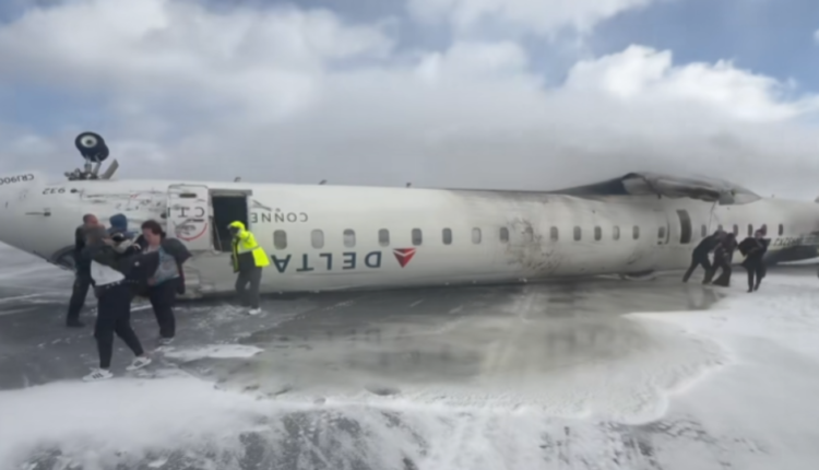 Delta Flight 271 inverted on Toronto runway after crash-landing.