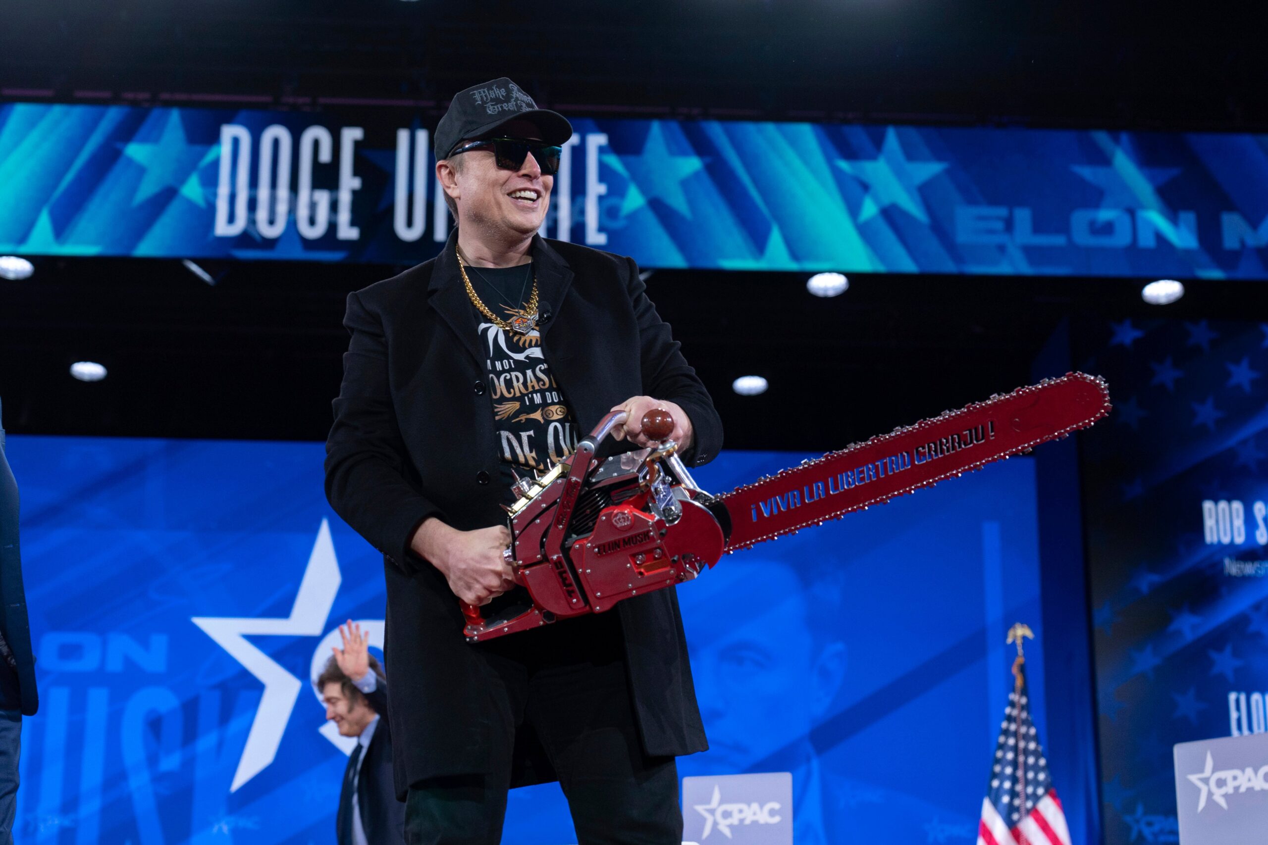 Elon Musk holds a chainsaw alongside Argentina’s President Javier Milei at CPAC.