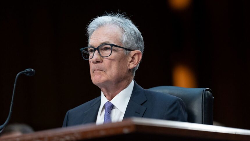 Federal Reserve Chair Jerome Powell testifying before Congress about inflation and interest rates.