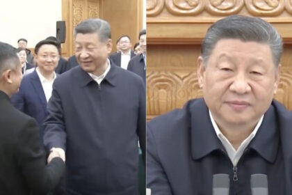 Jack Ma shaking hands with President Xi Jinping during the Beijing symposium.