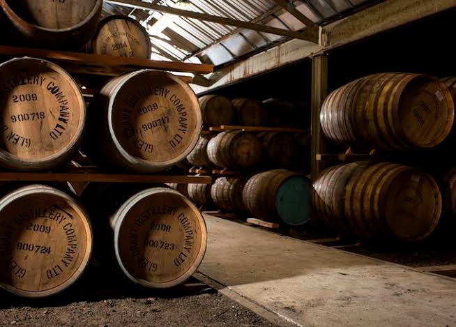 Aged whisky barrels in a Scottish distillery English Single Malt Proposal Sparks Clash