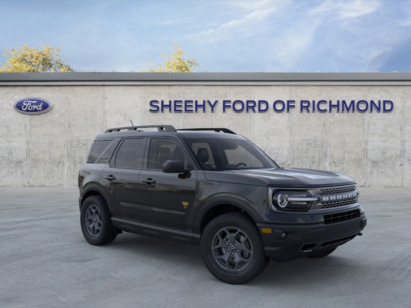 Ford Bronco SUVs displayed for sale at a dealership | metal tariffs