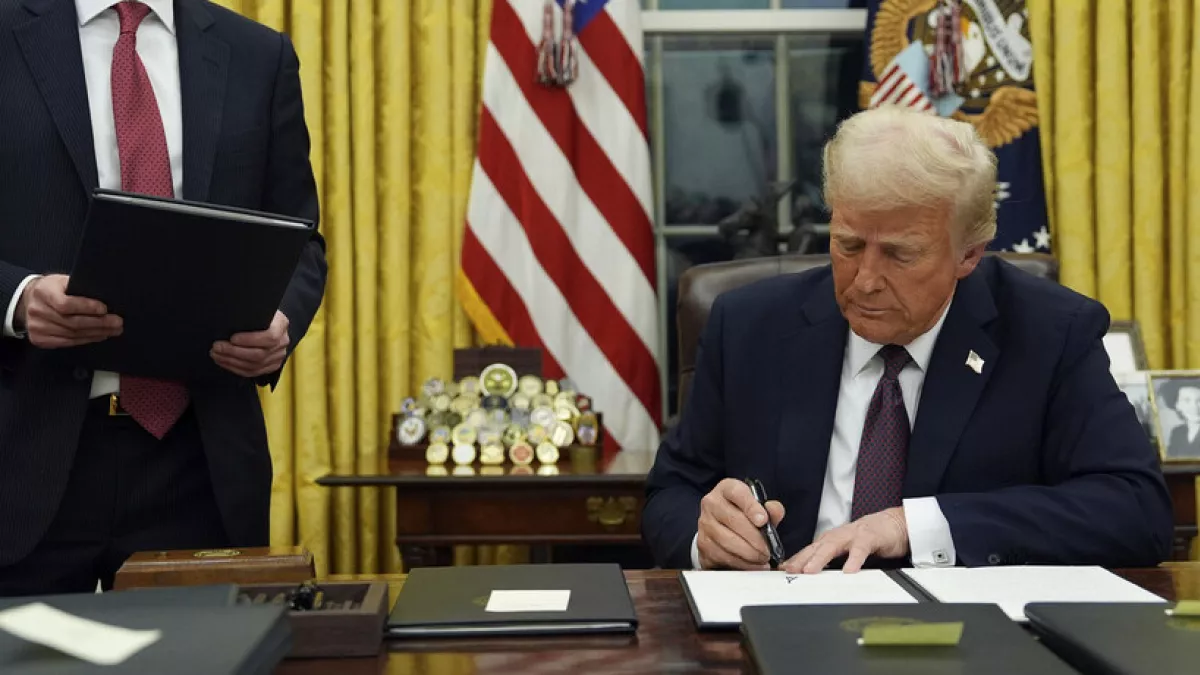 President Donald Trump signing executive orders in the Oval Office | US-India tariffs