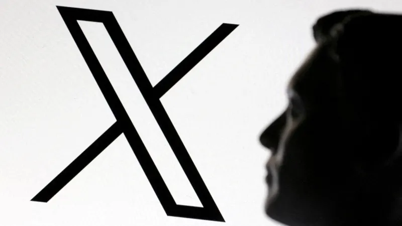 image showing a man silhouetted against the X logo on a bright white background. X outage